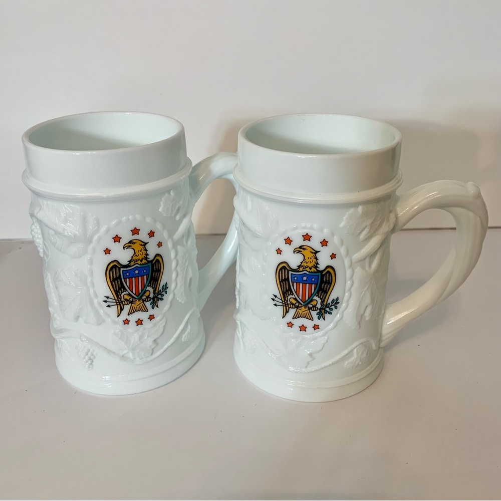 Two Vintage patriotic Mugs or Beer Steins white milk glass